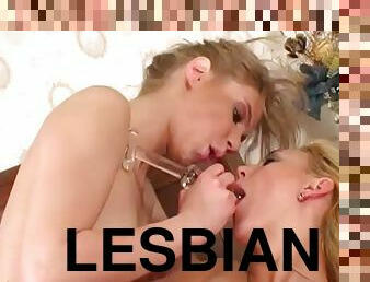 Nasty lesbians Ally and Isabella use a dildo to satisfy each other