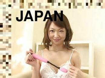 Pretty solo Japanese chick Yuuka Yamaguchi enjoys playing with toys
