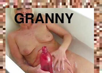 Granny in the bathtub has a wonderfully tight pussy