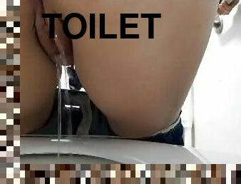 Molliepiper pissing in toilet