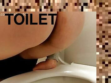 Sideways pee in gas station toilet