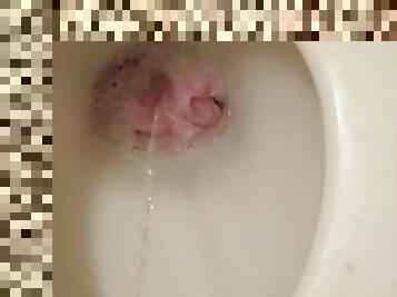 Throwing pink panties into the toilet bowl and pissing!