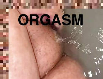 Rubbing orgasm in Tub