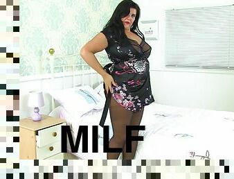 English milf Katie Coquard gets turned on in black tights