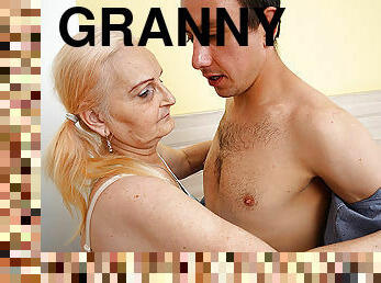 Young guy fucking a granny in bed