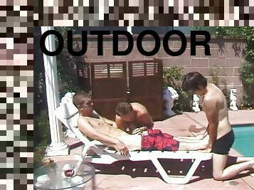 Tattooed guy gets his ass destroyed by two friends outdoor by the pool