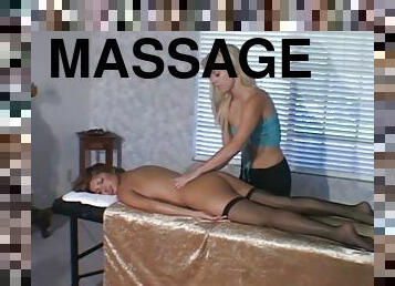 Two sexy girls lick feet after a massage session