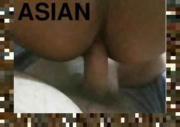 Asian rides white cub bareback