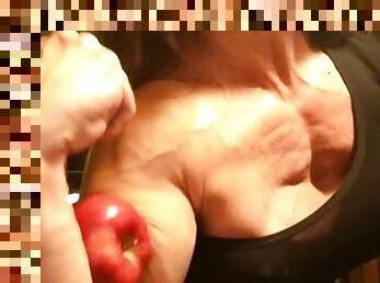 Muscle girl destroys bad apple with her huge bicep