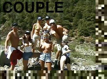 During a river rafting trip this couple fucks at camp