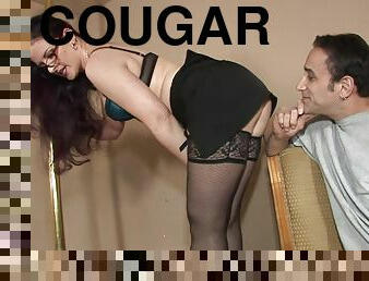 Mini-skirt clad cougar with glasses getting her pussy licked