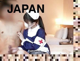 Japanese nurse gives a guy a handjob while showing her panties