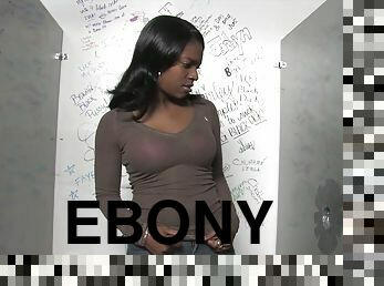 Luscious ebony is loving a cock out of a gloryhole