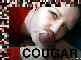 Wild cougar with short dark hair sucking a stranger's cock