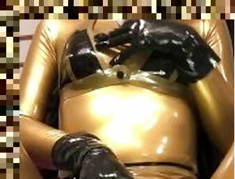 Gold rubber doll