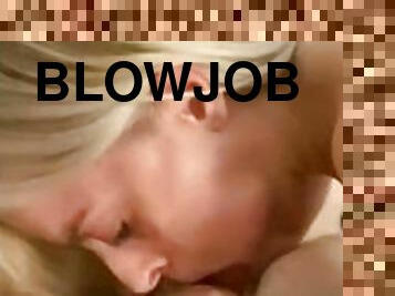 Sexy blonde giving blowjob