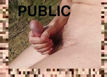 Nudist public handjob by the sea