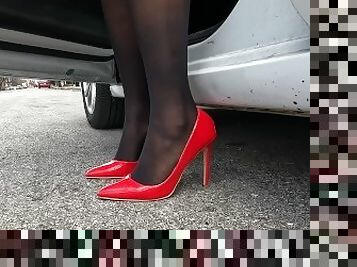 Lady driving in high heels & nylon stockings