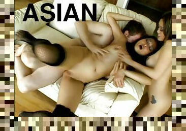 Two smoking hot Asian dolls are on a huge and thick cock