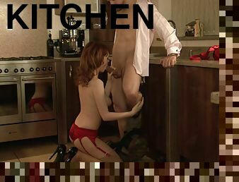 Elegant redhead moans as her pussy is spooked hardcore in the kitchen