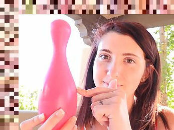 Brunette teen Lexi stuffs a bowling pin in her mouth and pussy