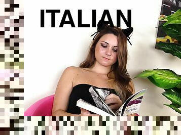 Pretty Italian babe kicks up her sexy feet while reading