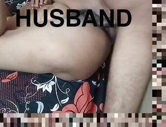 Husband And Wife Playing In Home