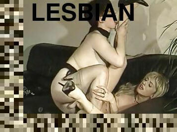Two women have lesbian fun on the sofa