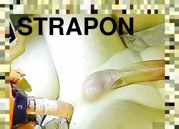 Strapon femdom eats cum