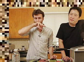 Good looking dude having fun with his friends in the kitchen