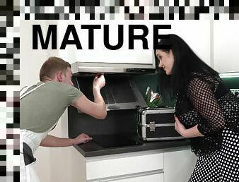 Mature brunette enjoys during sex in the kitchen - Raisha E.