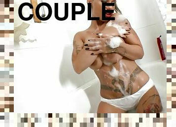 Tattoo couple fucking in bath until he shoots his load between her tits