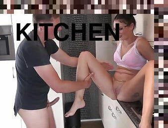 Jacky with shaved pussy being roughly fucked in the kitchen
