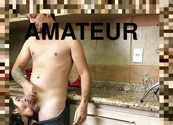 Amateur hottie gives head in the kitchen and gets fucked good