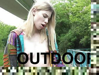 Outdoors solo video of skinny Milena Devi playing with her pussy