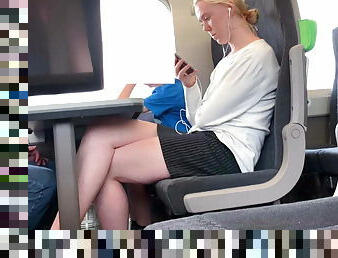 Blonde with beautiful legs on the train