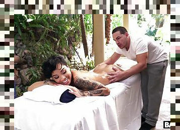 Tattooed ebony model Honey Gold gets massaged and fucked good