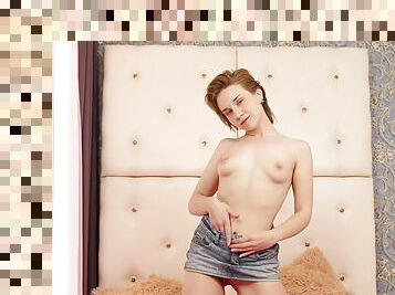 Cute solo model Alice Klay drops her miniskirt to pleasure her cunt