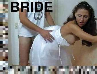 The bride tried on a wedding dress and the groom immediately turned on