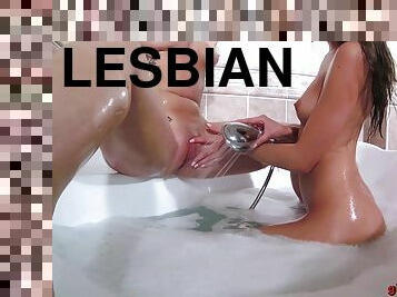 Naughty lesbian babes play in the bathroom and make each other cum