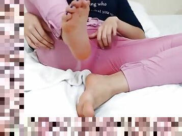 Girl footjob with toy and pissing in pants