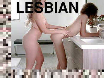 Natasha Ianova and Gia Gelato play with their pussies in the bathroom