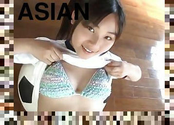 Candy cane striped bikini is a delight on an Asian teenager