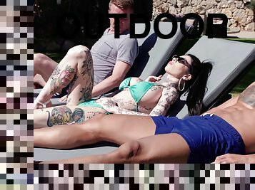 Outdoor threesome fucking by the pool with tattooed slut Megan