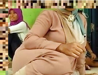 Beautiful Indonesian mom in hijab
