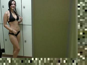 Hot couple decides to get it on in a noisy changing booth at a swimming pool