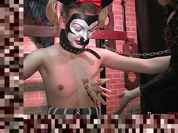 Mature lady is playing really wild with painful clamps on masked teen