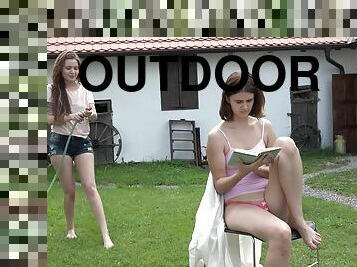 Shelley Bliss and her friend masturbate together outdoors