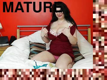 Mature brunette amateur buxom MILF Sabrina Jade plays with her tits