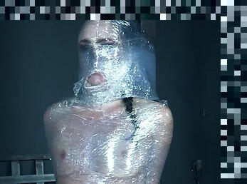 Alex More wrapped up in tape and abused hardcore in a dungeon